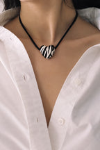 Zebra heart pendant