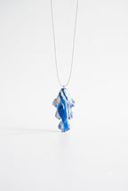 White fish pendant