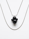 Black Dot Doll Pendant