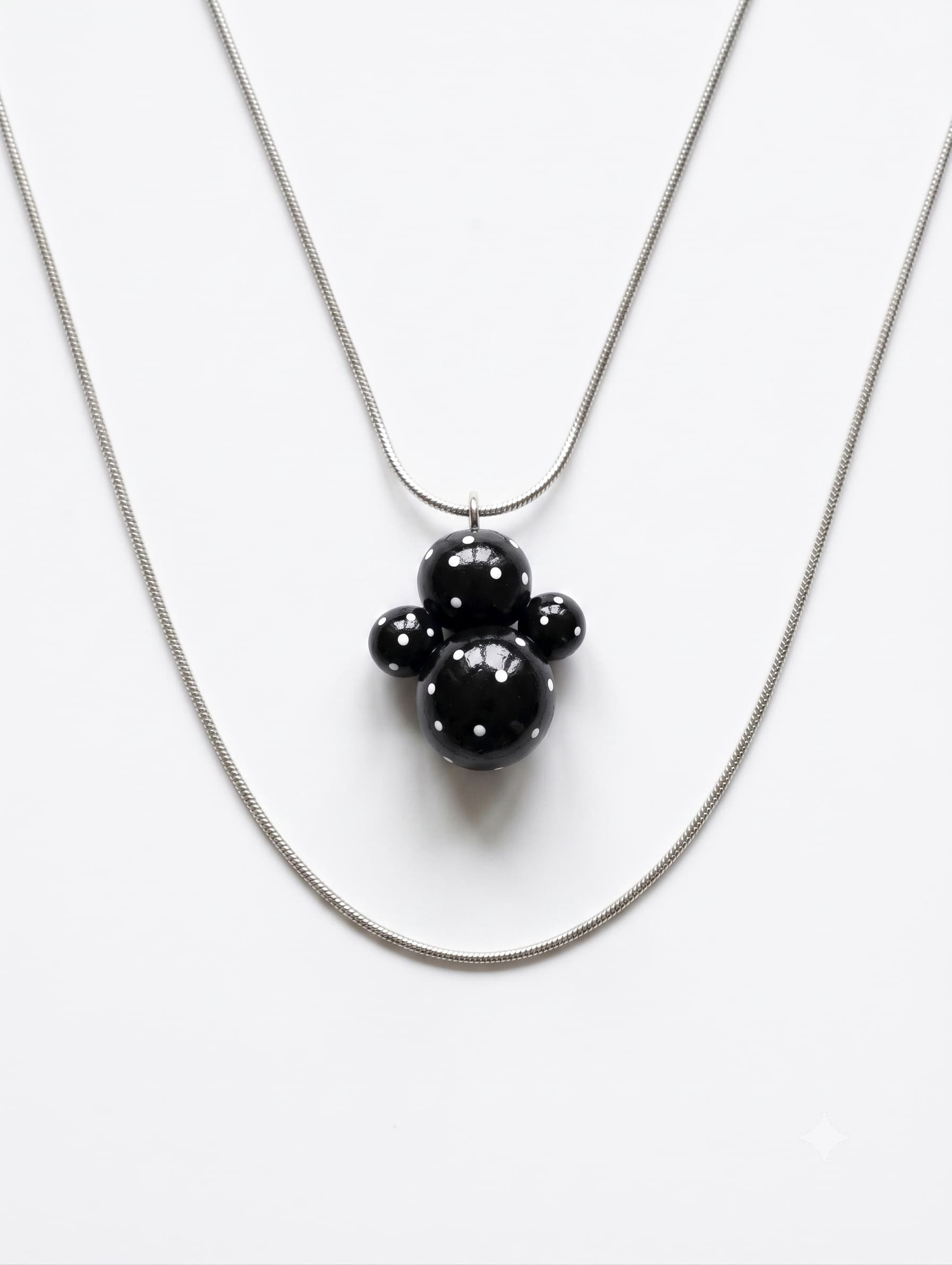 Black Dot Doll Pendant