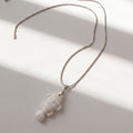 White fish pendant