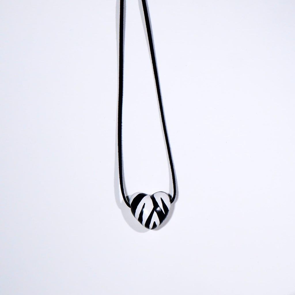 Zebra heart pendant