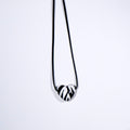 Zebra heart pendant