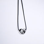 Zebra heart pendant