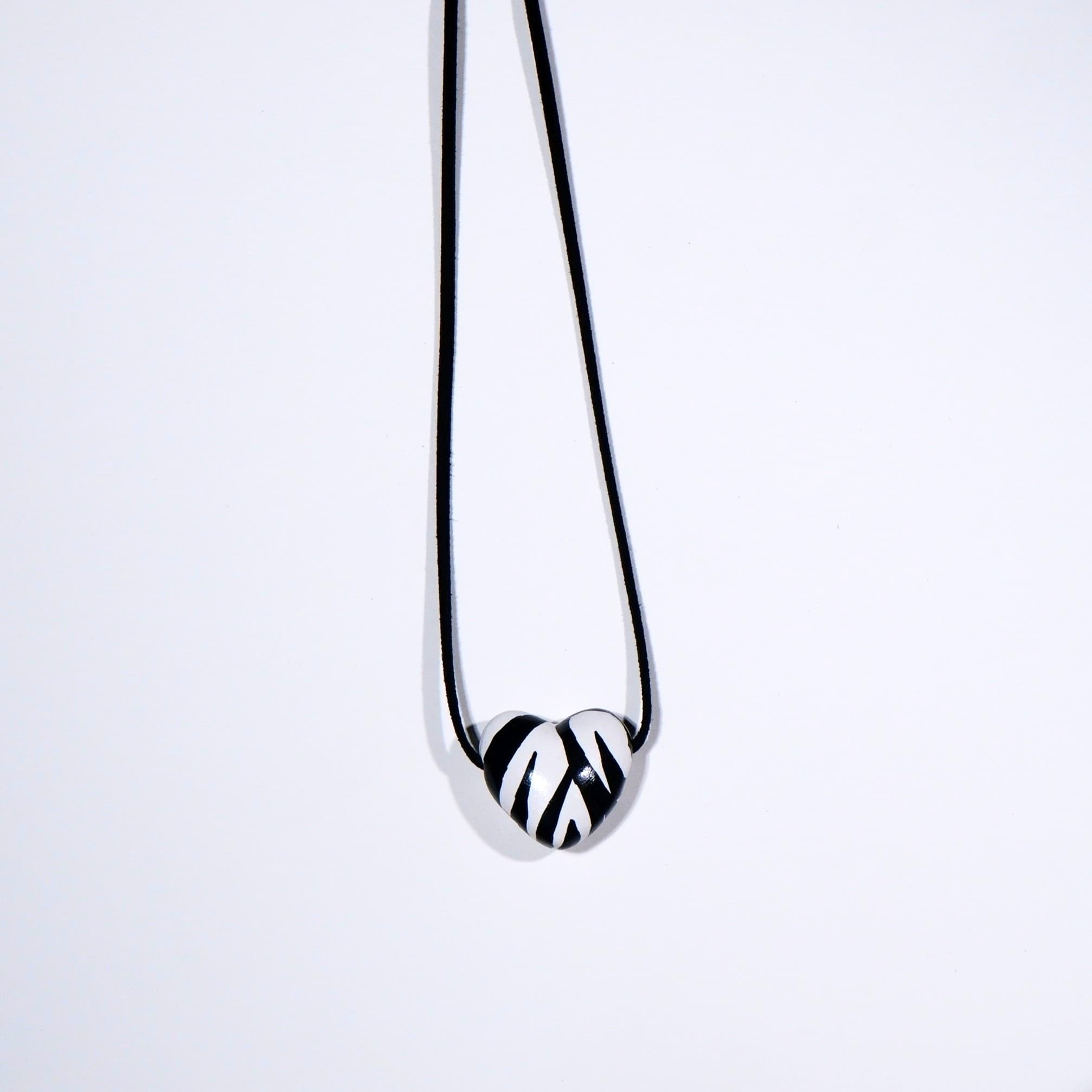 Zebra heart pendant