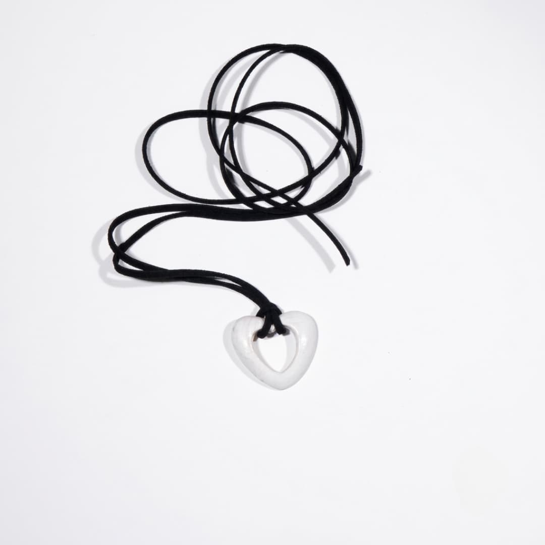 White Hollow Heart Pendant