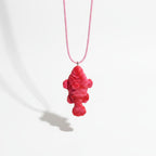 White fish pendant