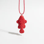 White fish pendant